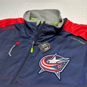 NWOT Columbus Blue Jackets Men's M NHL Center Ice Kinetic Fit Windbreaker Reebok